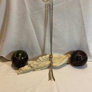 Tri-colored 24” knot necklace.